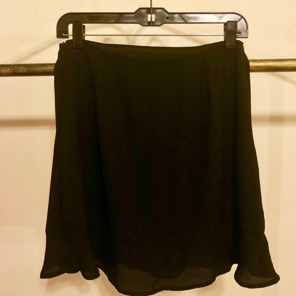 Black mini skirt with ruffle hem (never worn!)